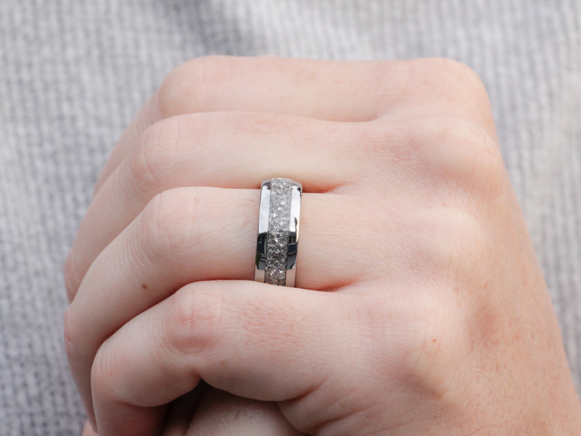 white diamond tunsten ring, lab grown diamond crushed gemstone inlay, 8mm polished silver wedding band, mens hand photo