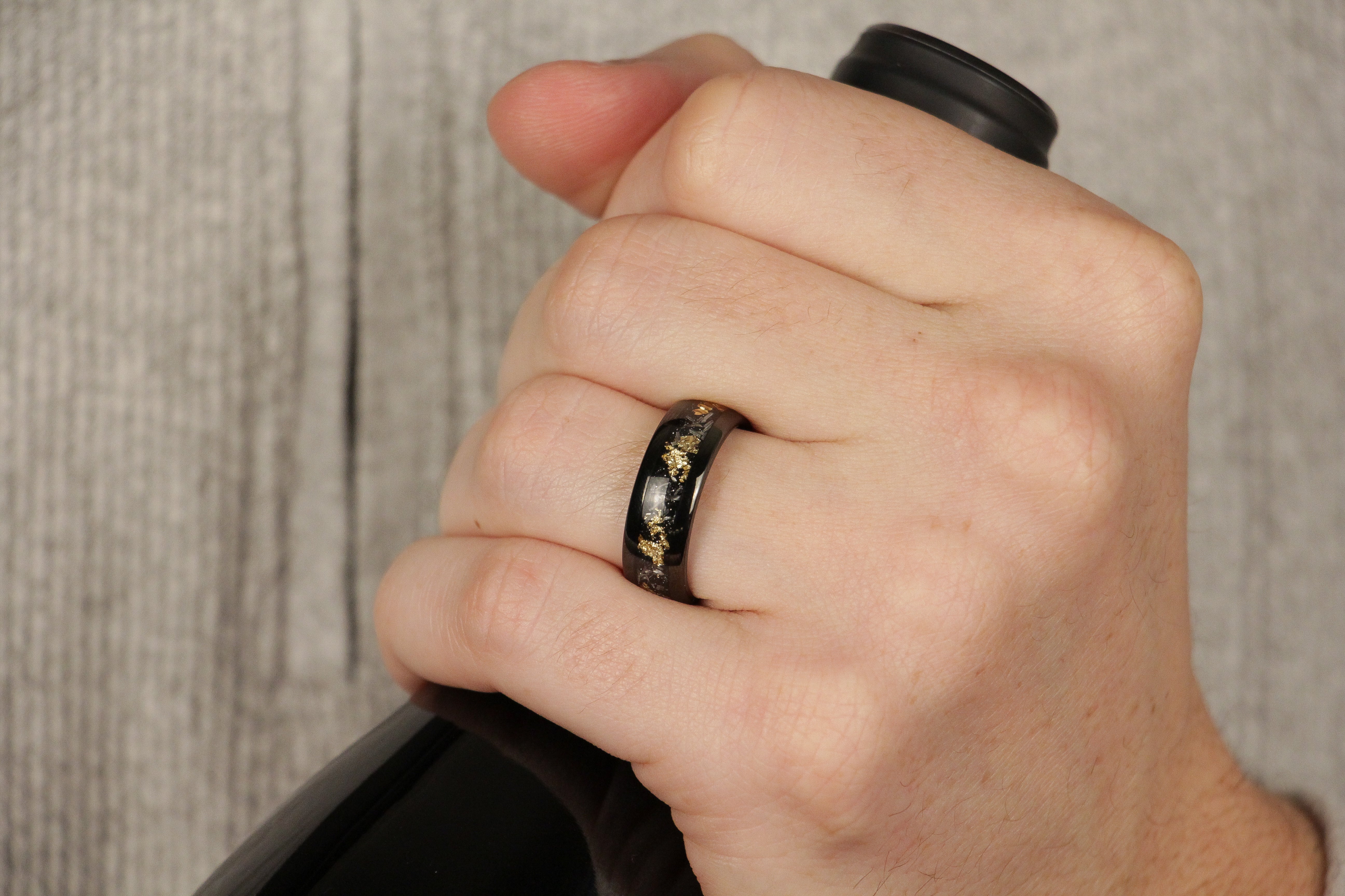 8mm black tungsten ring, gold leaf meteorite sandstone inlay, mens hand photo wedding band