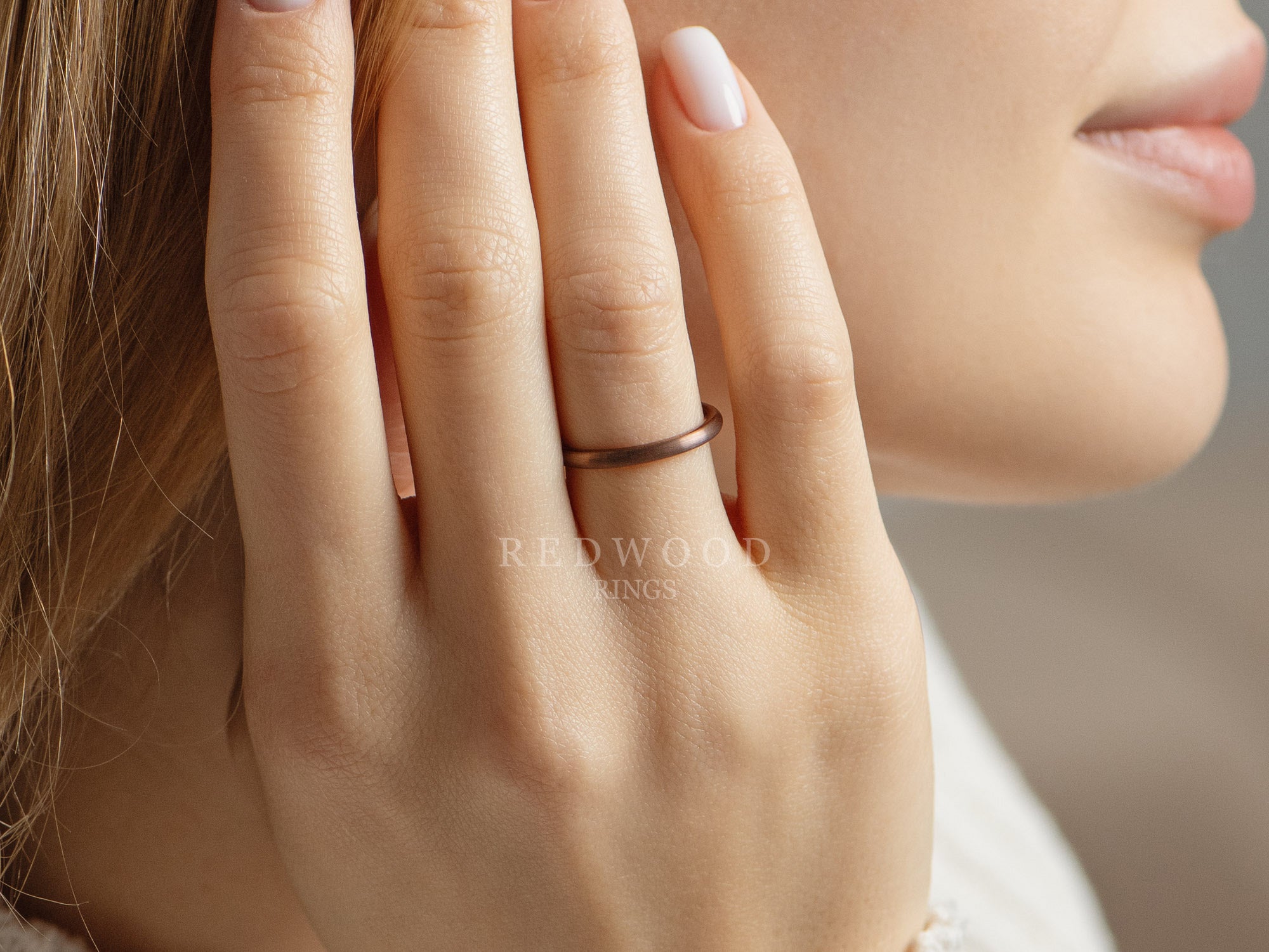 2mm brown tungsten ring, womens hand photo, watermarked