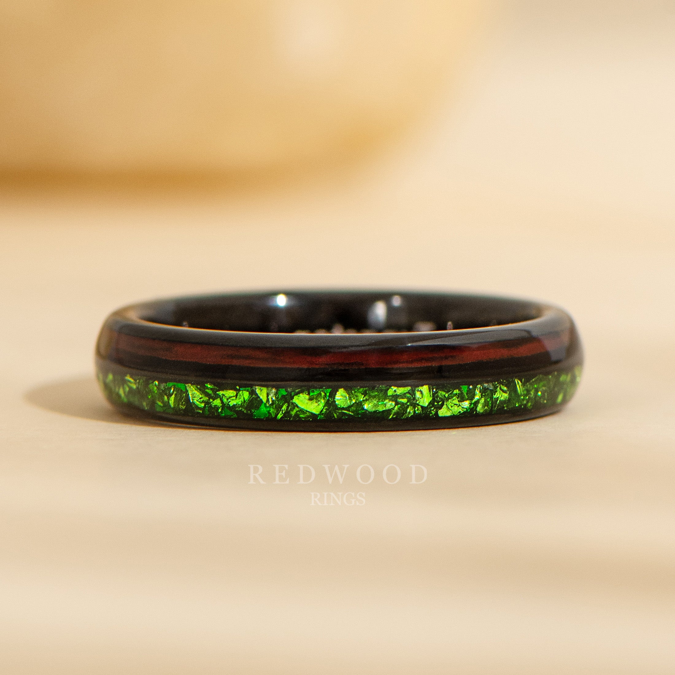 4mm black tungsten ring with redwood and green emerald dual inlays, forest inspired womens ring