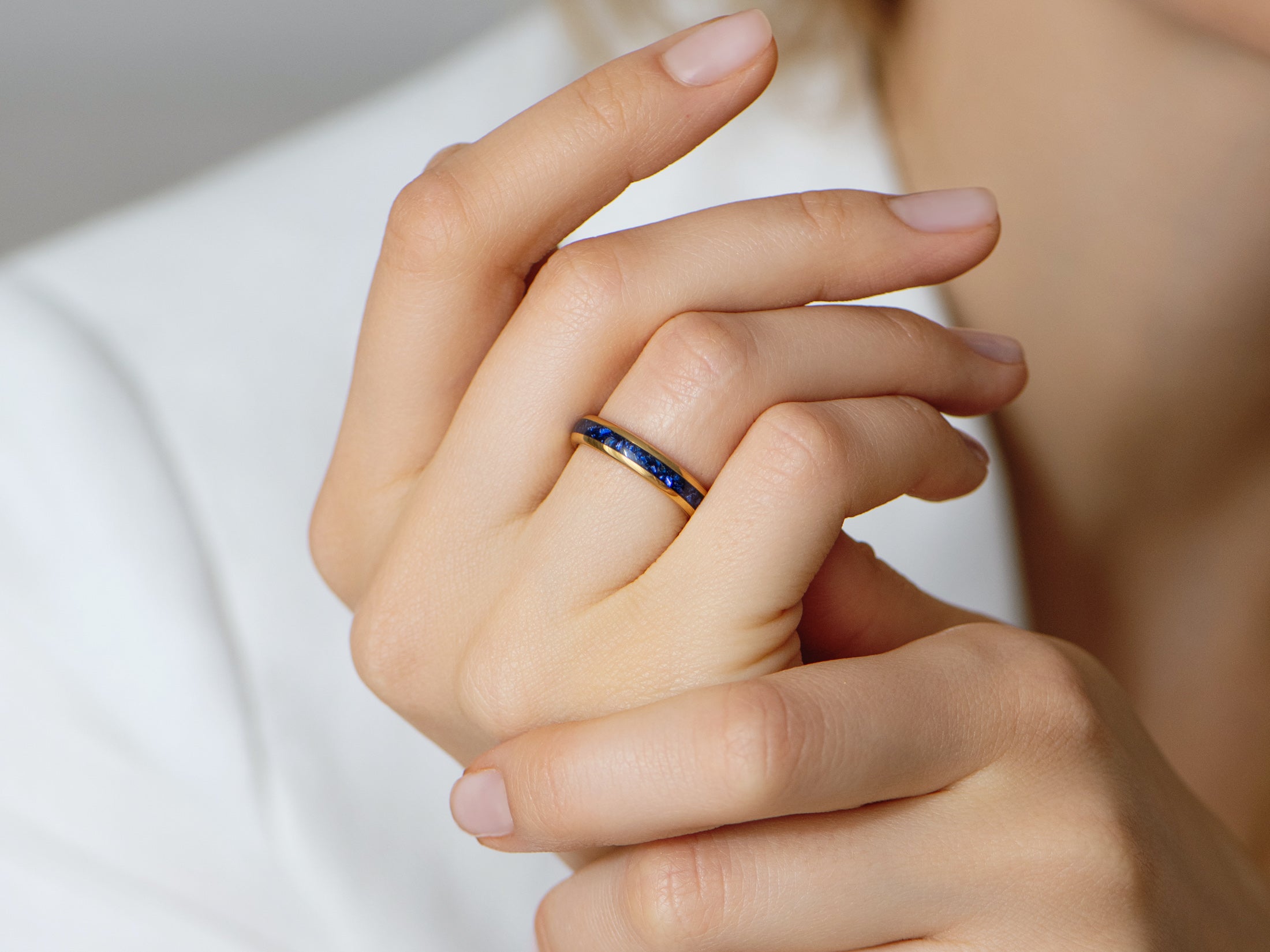 4mm gold and sapphire tungsten ring, womens hand photo