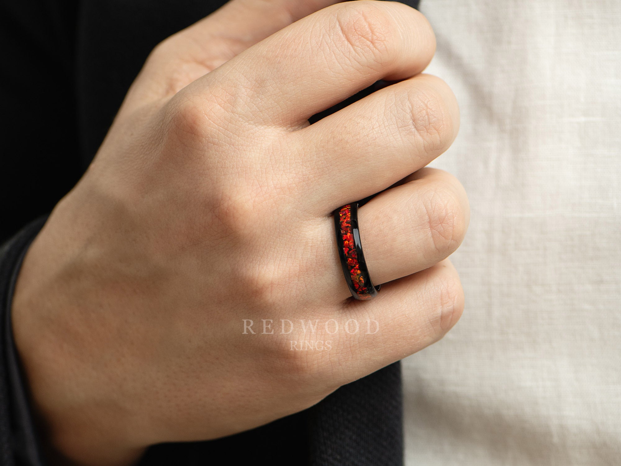 6mm red opal, black tungsten ring, mens hand photo