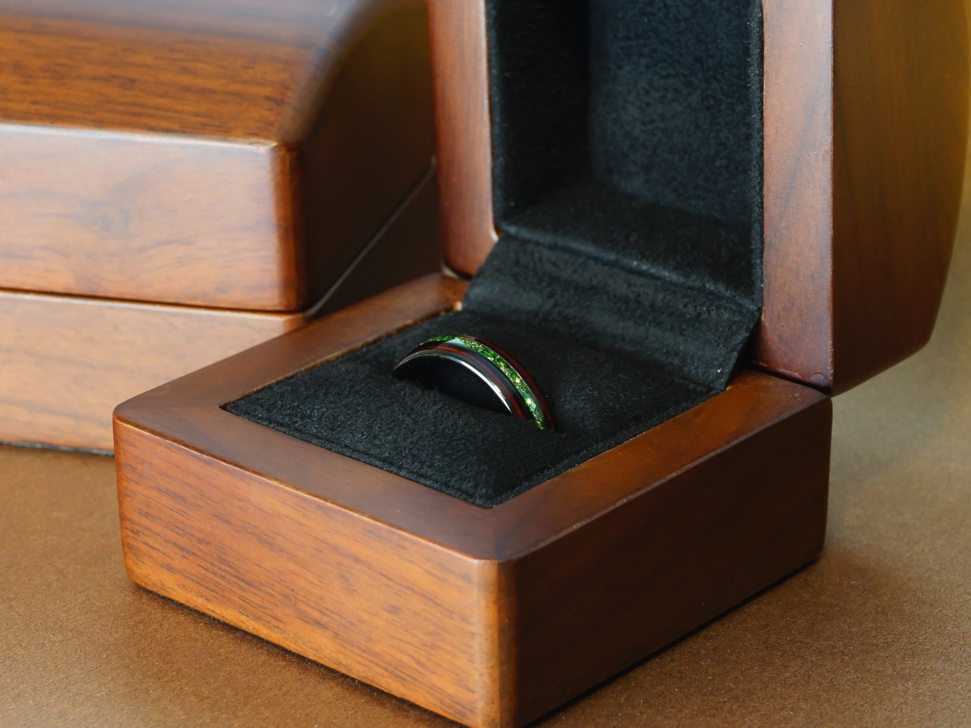 6mm black emerald tungsten ring in a luxury wood ring box black polished ring with green emerald and red sequoia red wood inlays