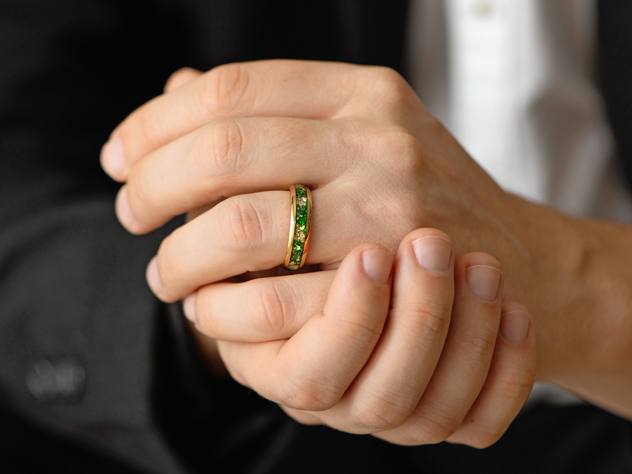 6mm gold tungsten ring with gold foil and emerald inlay, mens hand photo`