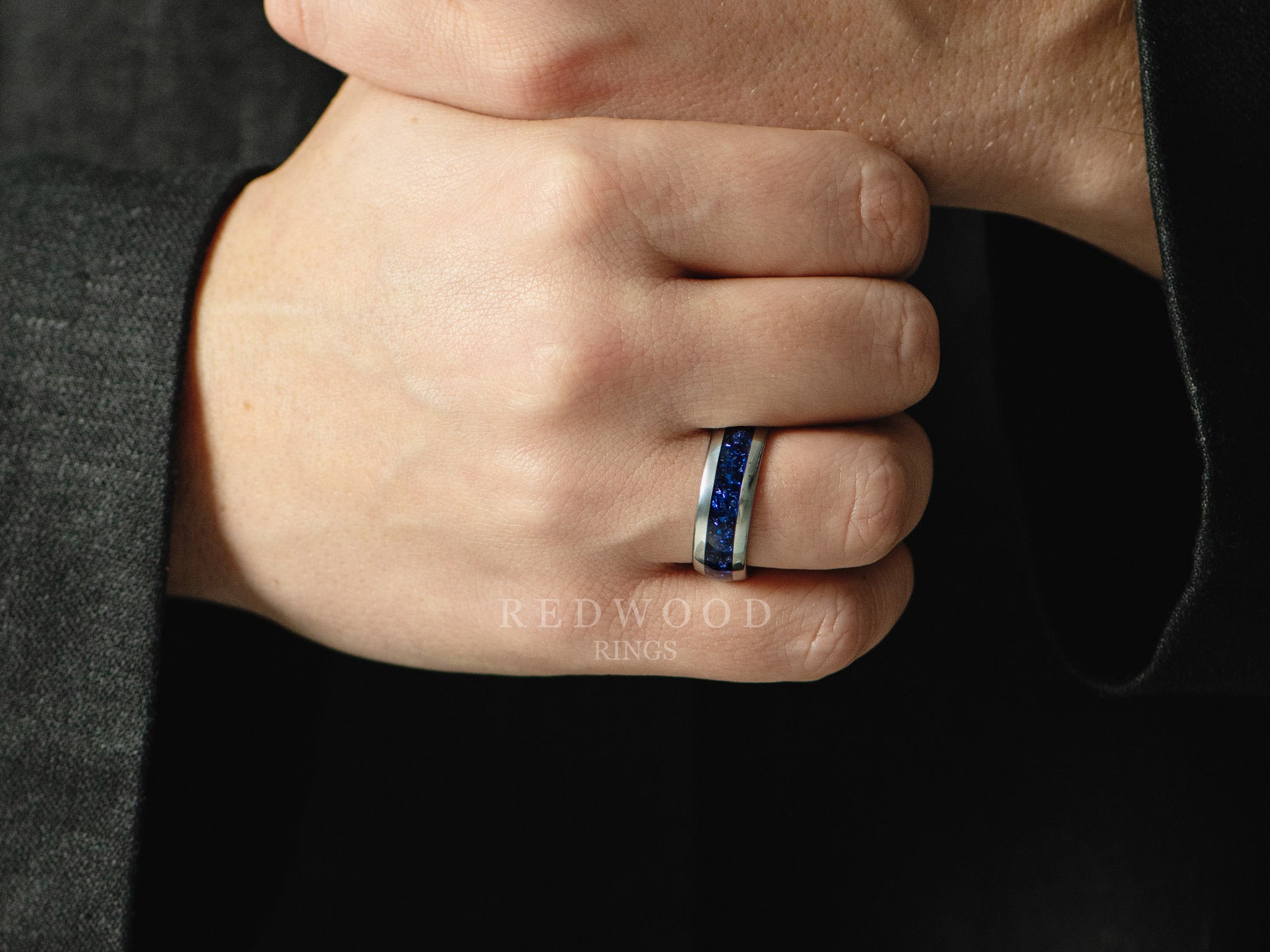 8mm silver tungsten with blue lab sapphire, mens hand photo, watermarked