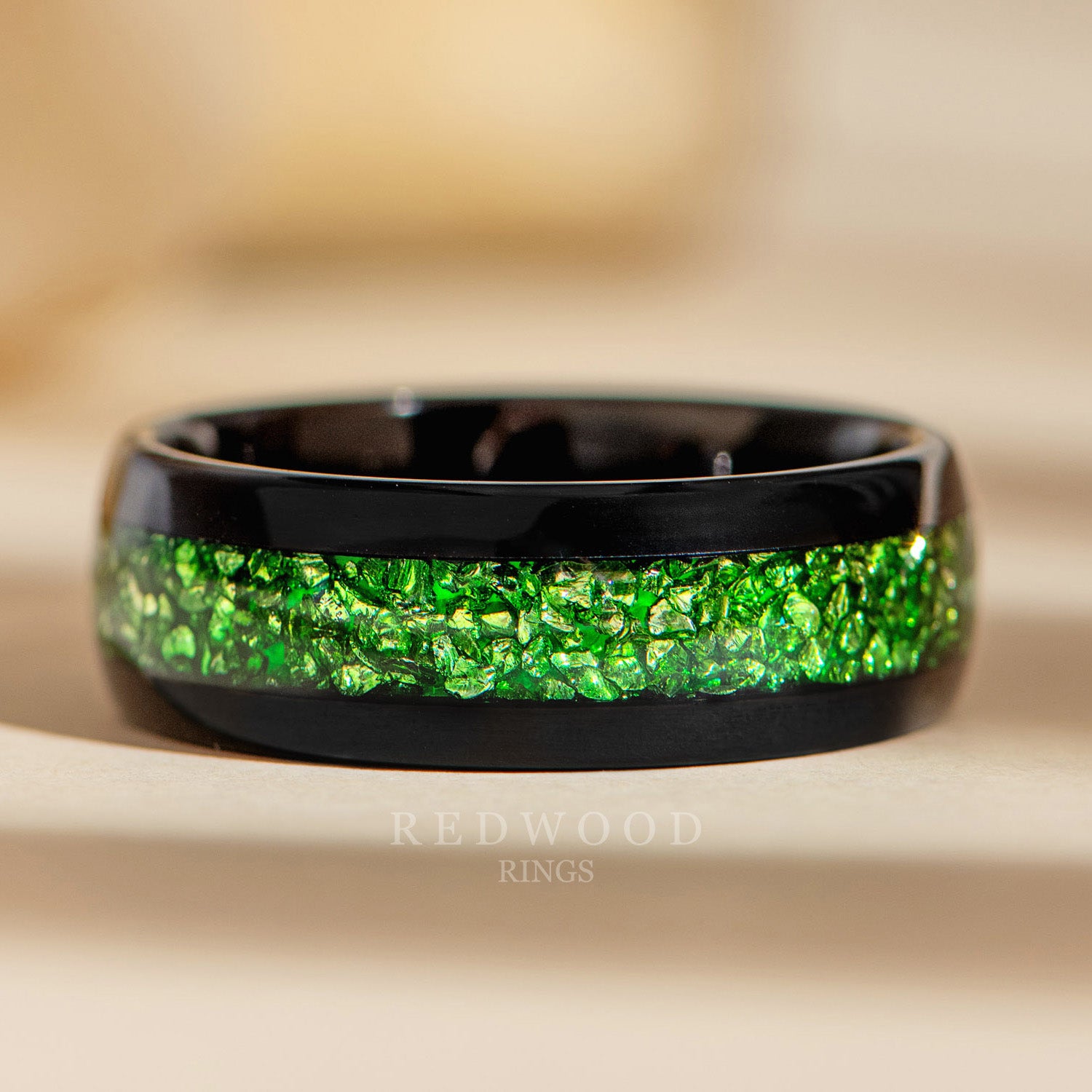 8mm black tungsten ring with green lab emerald inlay, luxury photo watermarked