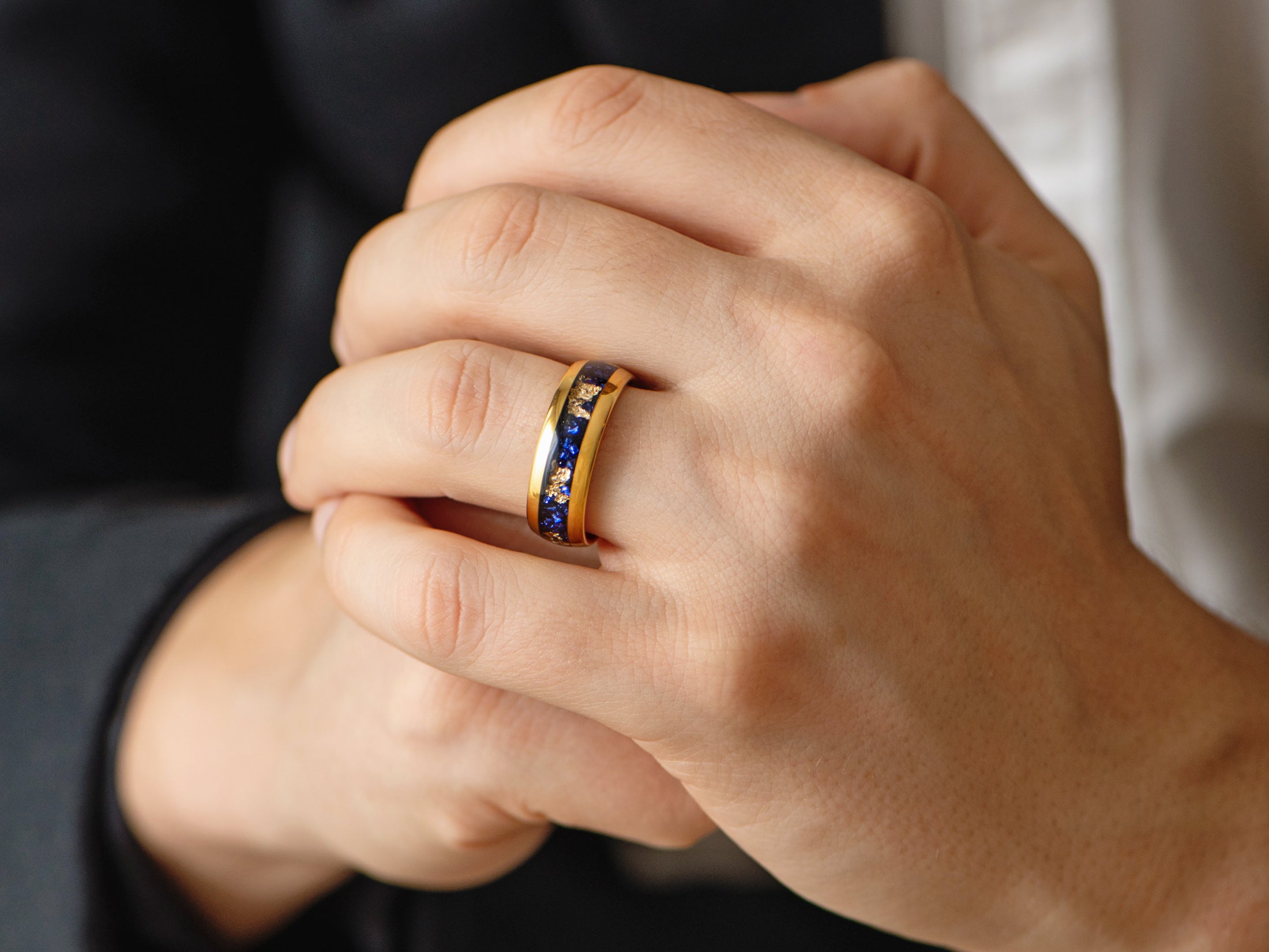8mm gold tungsten ring with gold foil and sapphire inlay, mens hand photo