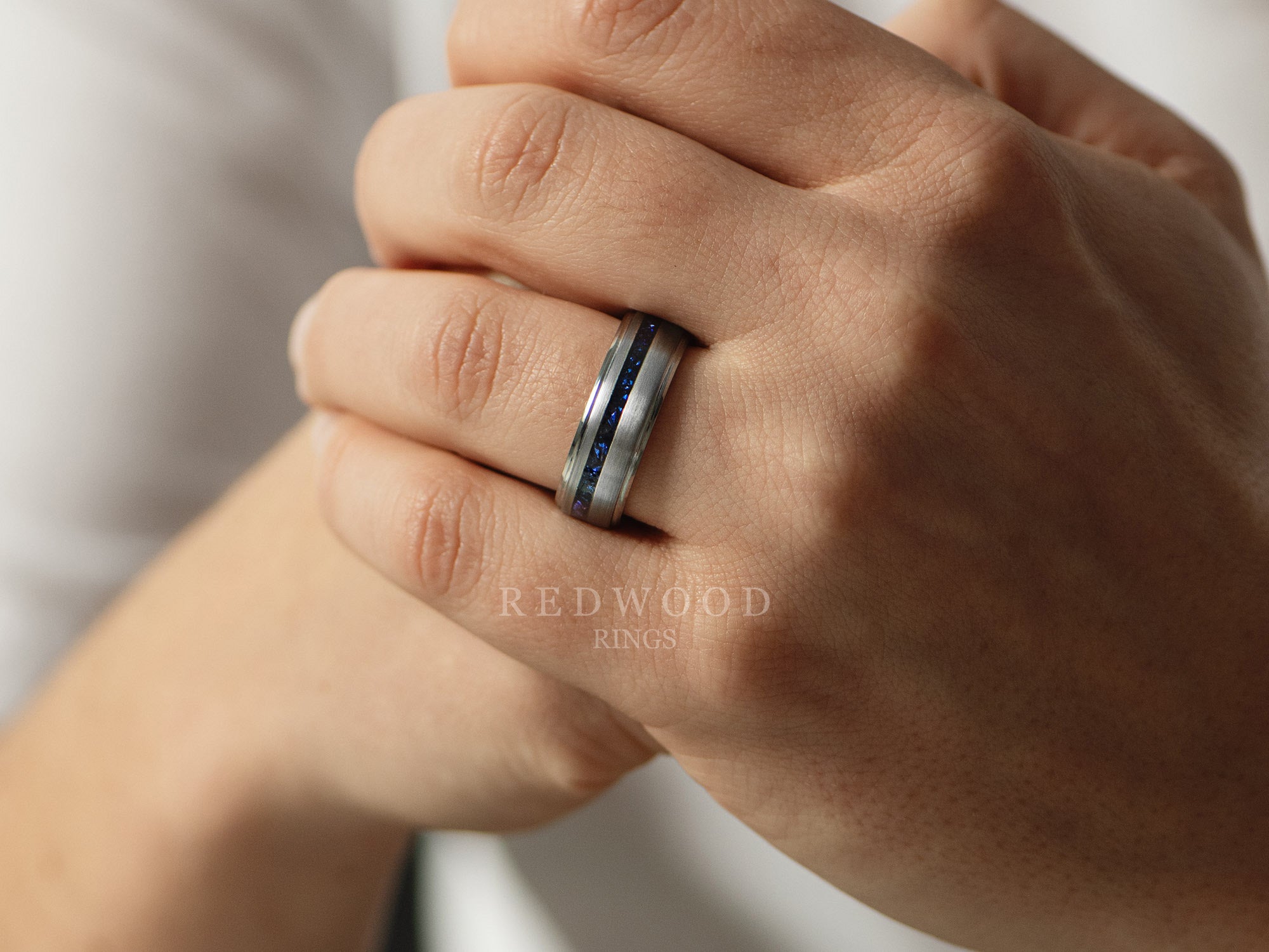 8mm silver gentlemans band with blue sapphire, mens hand photo watermarked