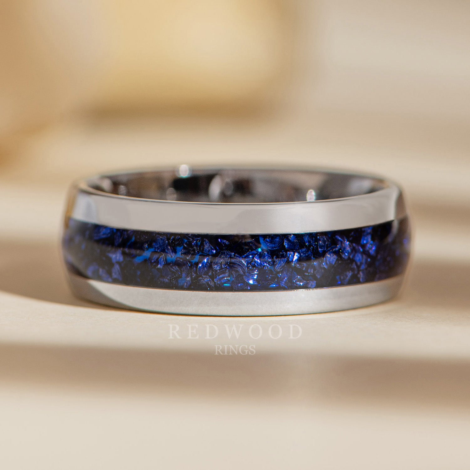 8mm silver tungsten ring with blue lab sapphire inlay, luxury photo watermarked