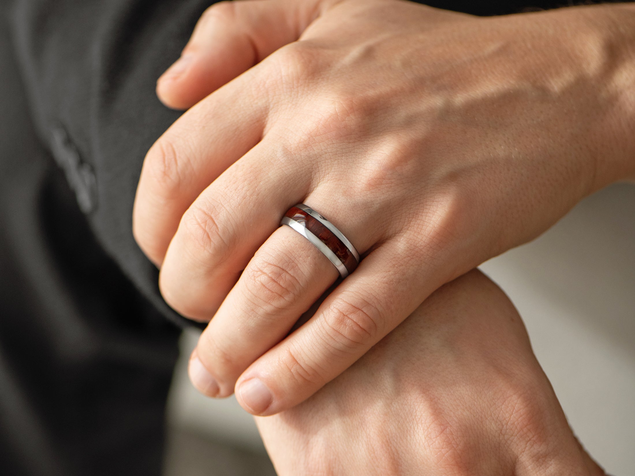 8mm silver tungsten ring with redwood inlay, mens hand photo