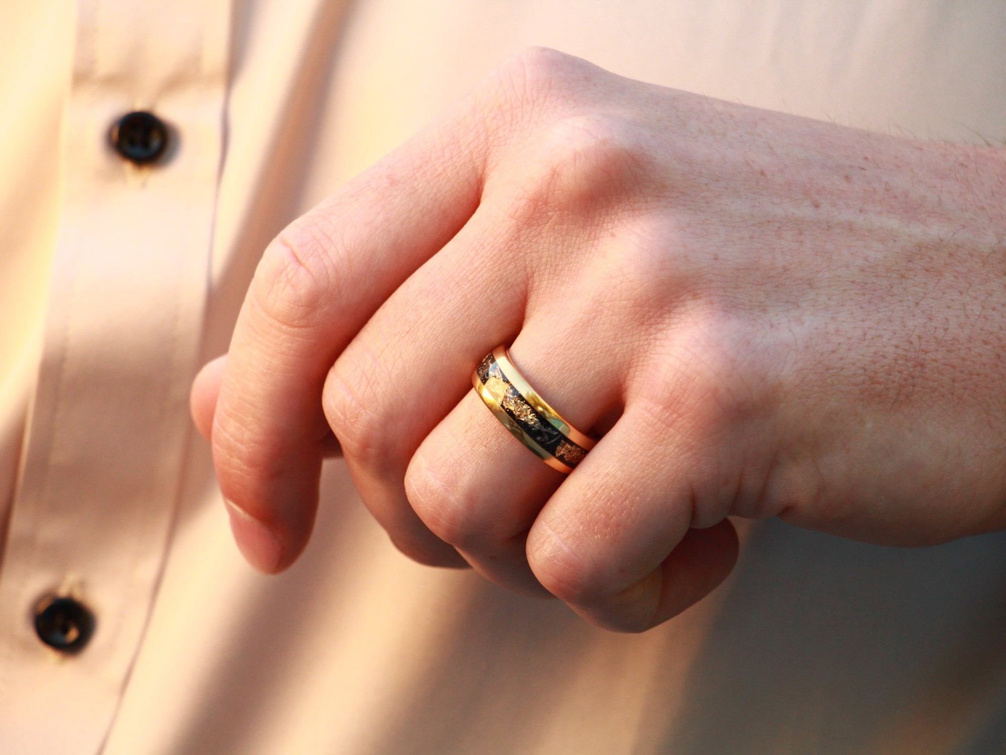 gold leaf tungsten ring, meteorite and gold leaf inlay, 8mm yellow gold wedding band, mens hand photo