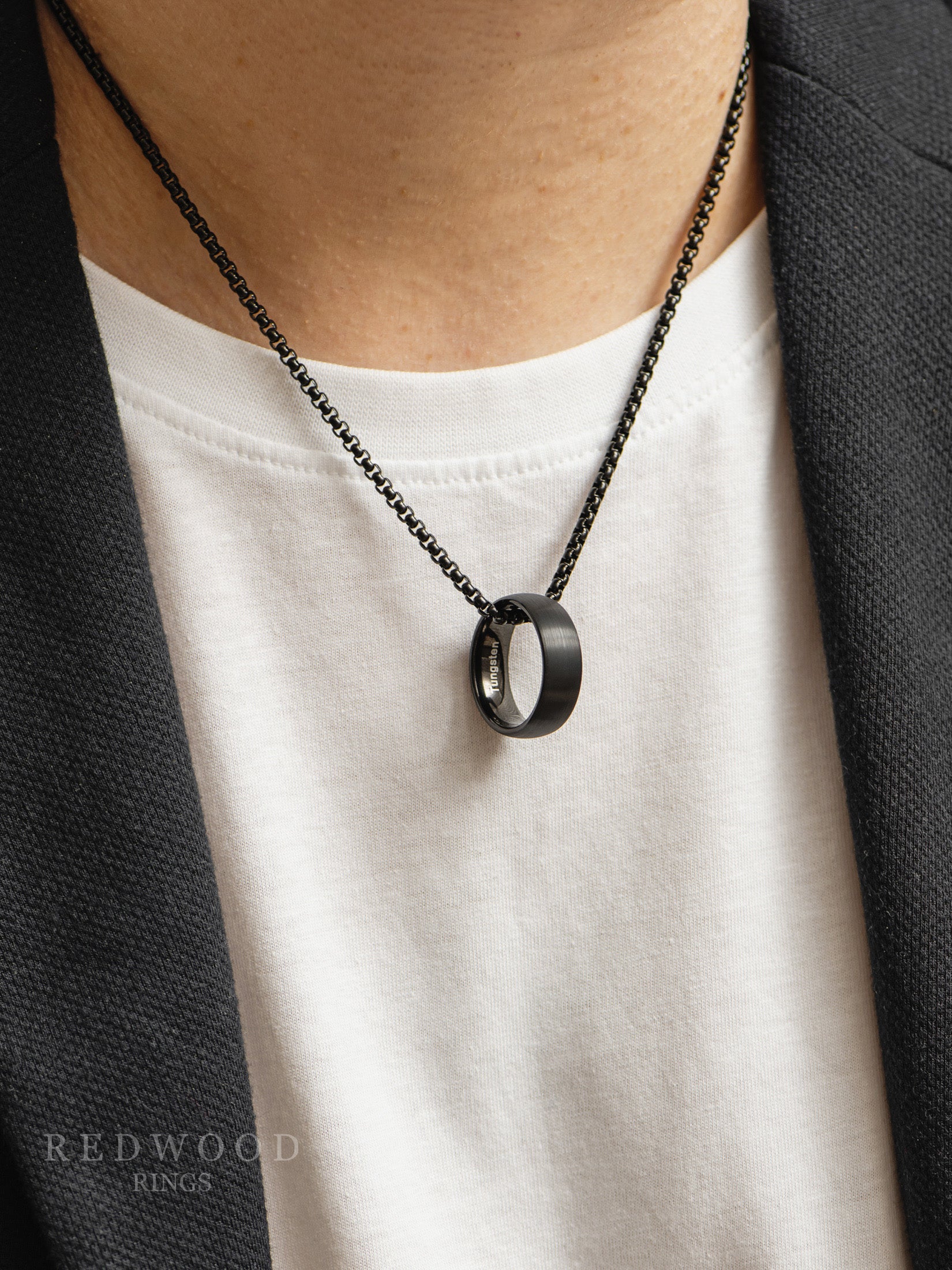 mens black ring and chain necklace model