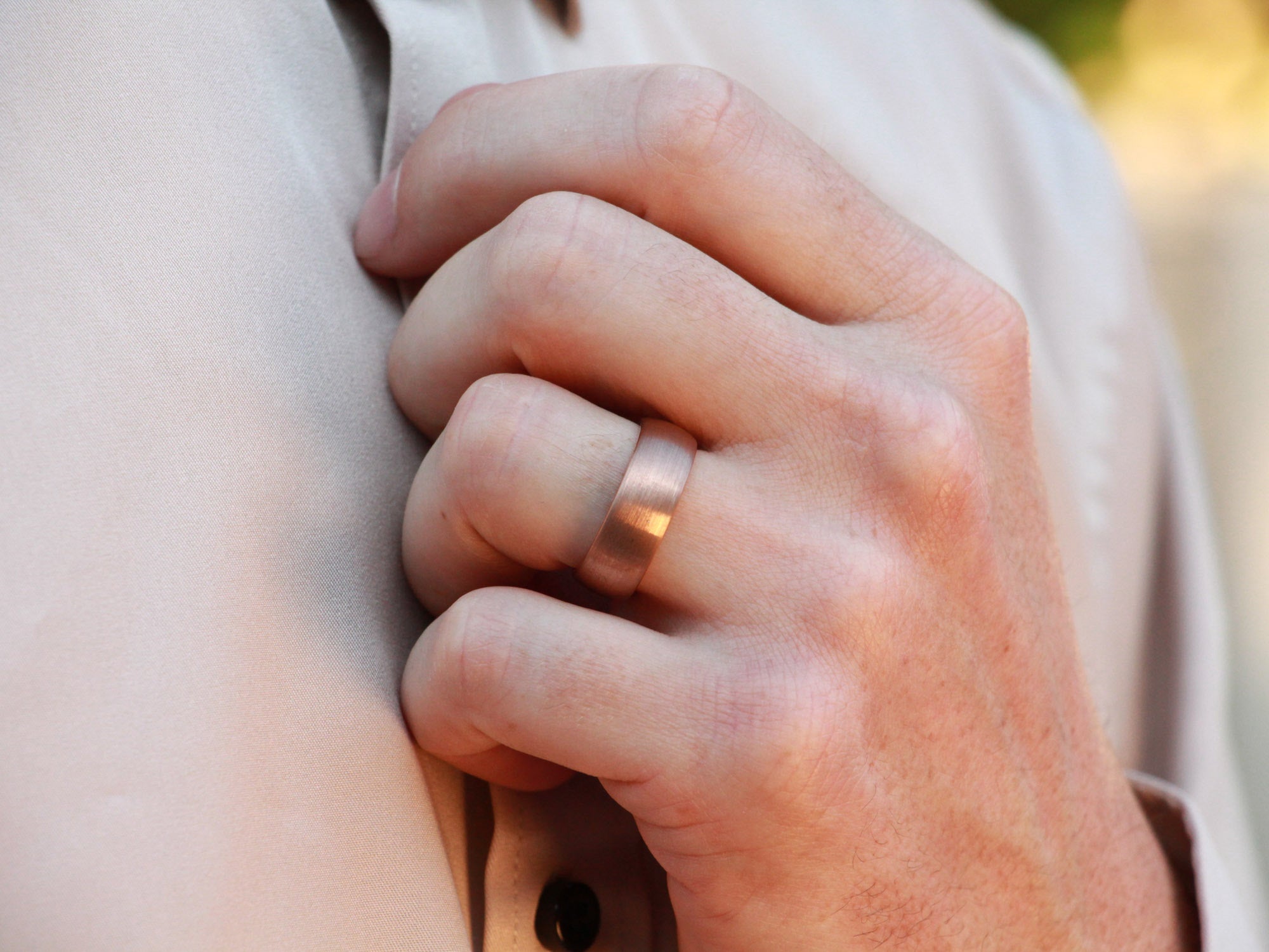 rose gold tungsten ring, 8mm brushed rose gold wedding band, mens formal hand photo