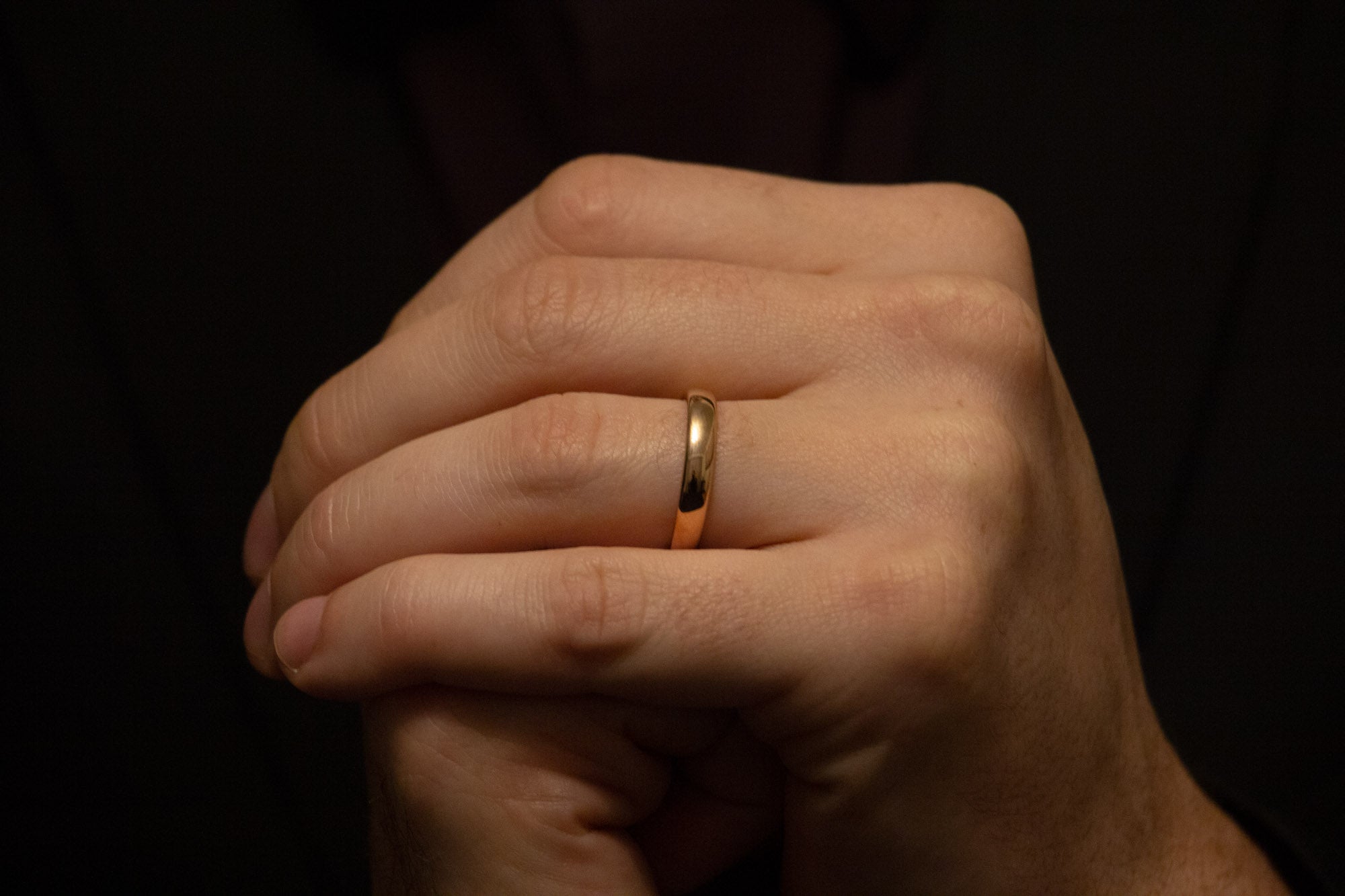 Rose Gold Tungsten Band with a Polished Finish, Shown worn as a Men's Wedding Ring