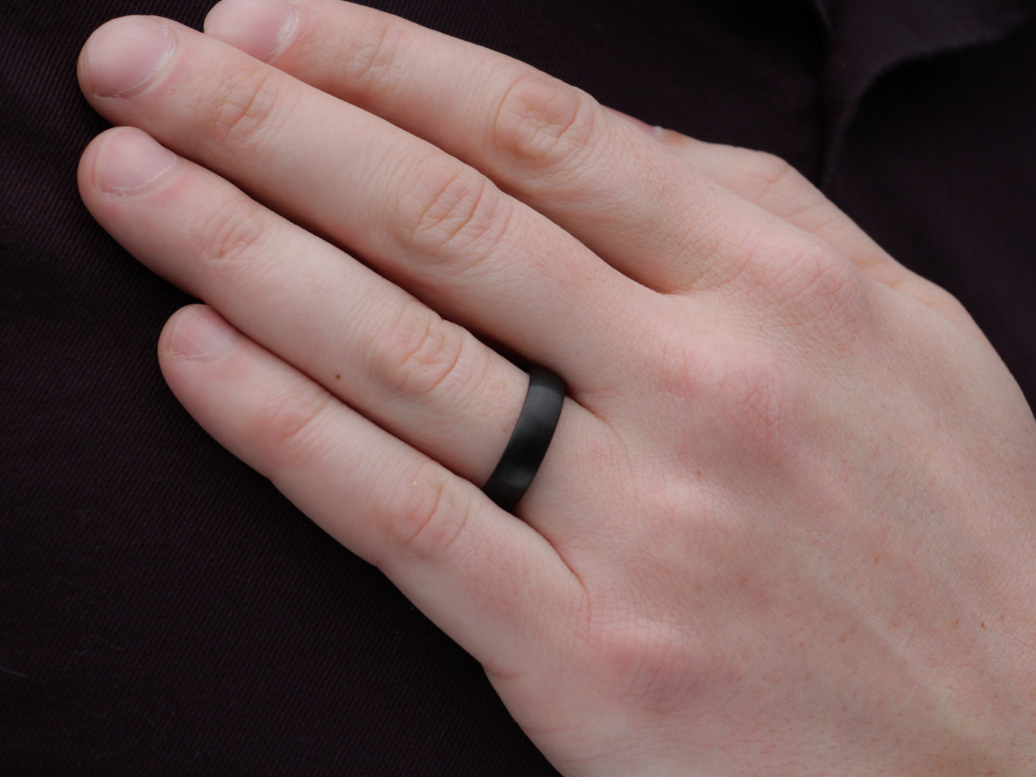 Black and Silver Tungsten Band worn as a Men's Wedding Ring